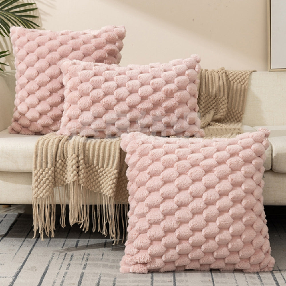 Plush cushion cover with a raised textured finish