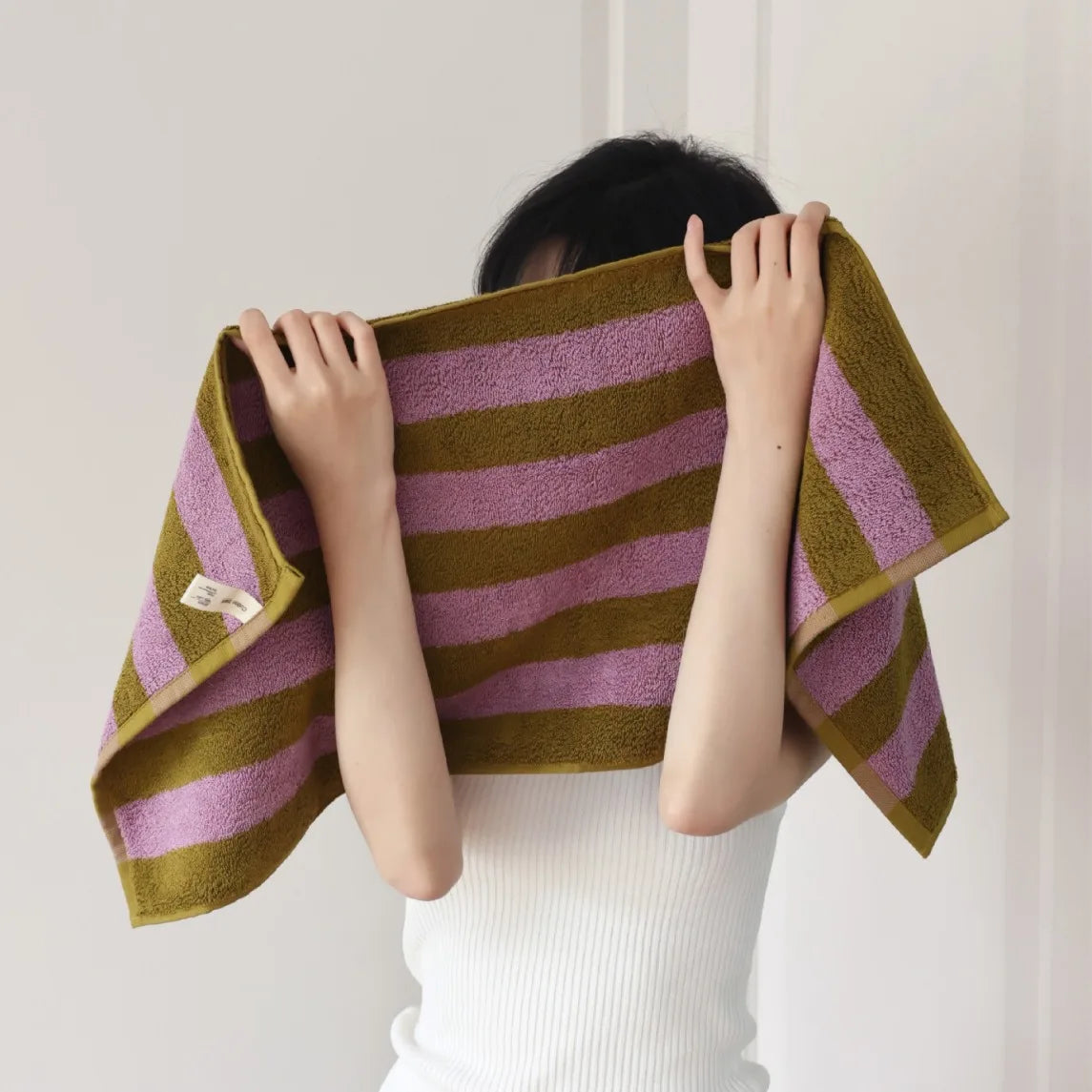 Striped combed-cotton towel with a jacquard-woven finish