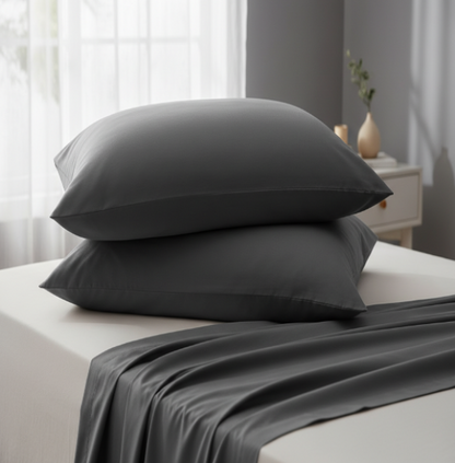 A couple of pillowcases, of bamboo fabric, of colour #616263