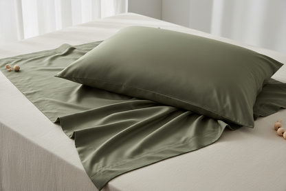 A couple of pillowcases, of bamboo fabric, of colour #626556